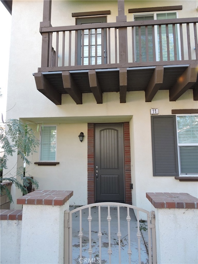 Front door and balcony.