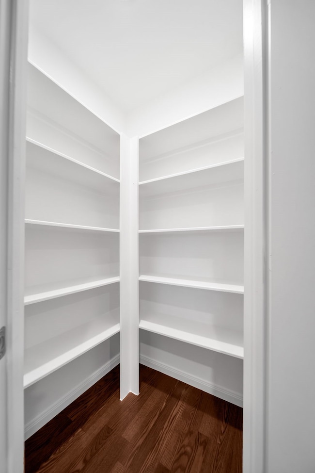 Corner pantry provides abundant storage space.