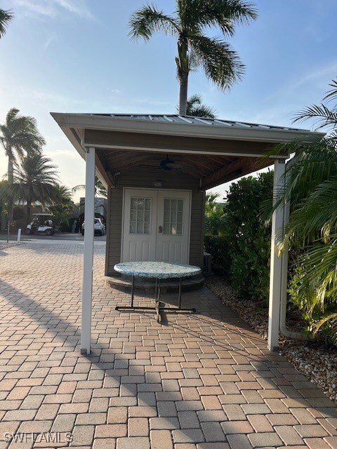 View of patio / terrace with ceiling fan