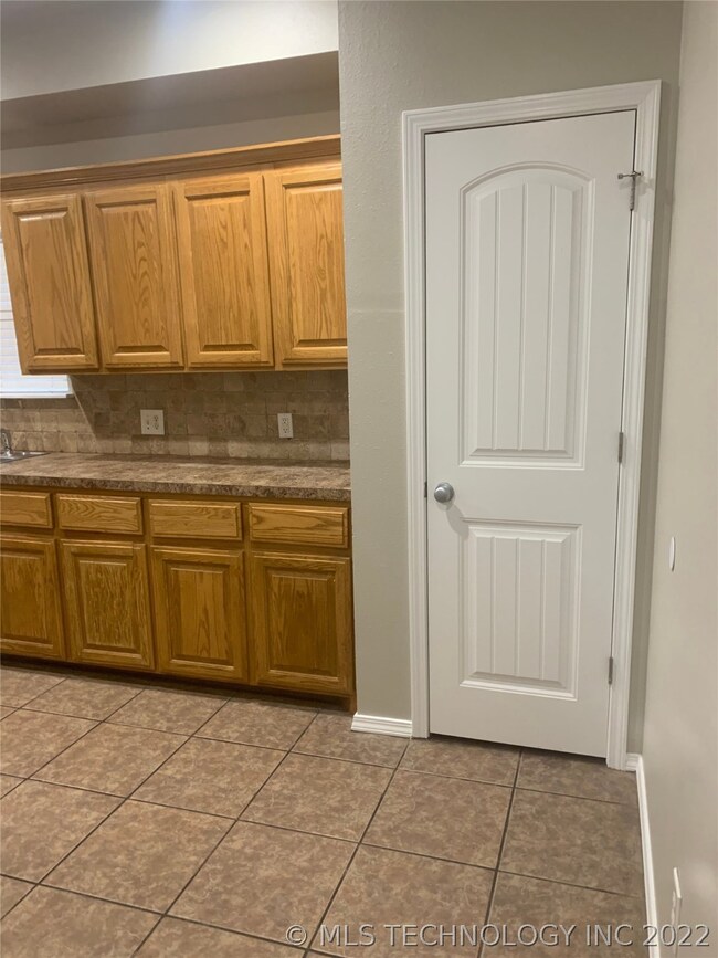Pantry / Kitchen from Garage Door