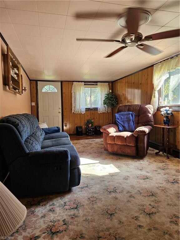 Living room with a wealth of natural light, ceilin