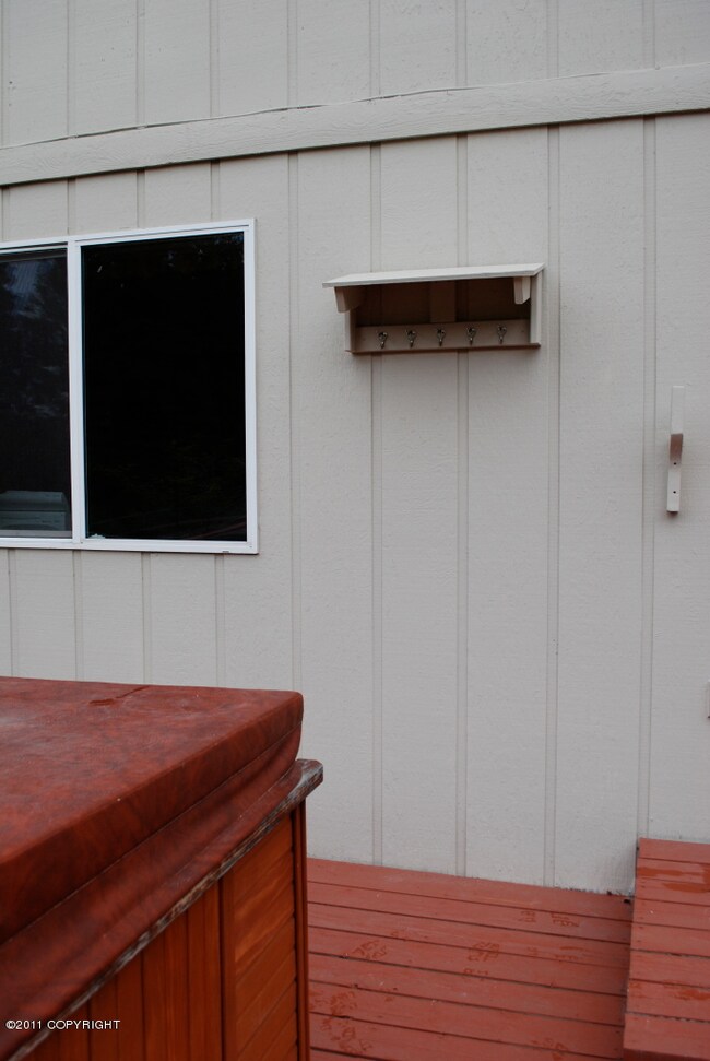 Towel rack for hot tub