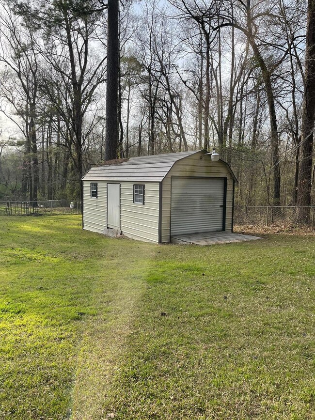 View of outdoor structure featuring an outdoor str