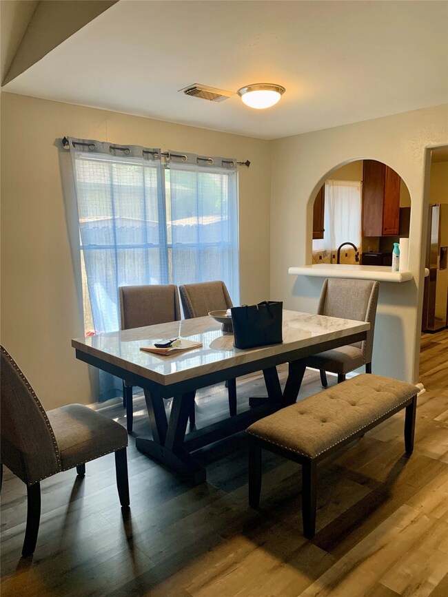 View of dining area to kitchen.