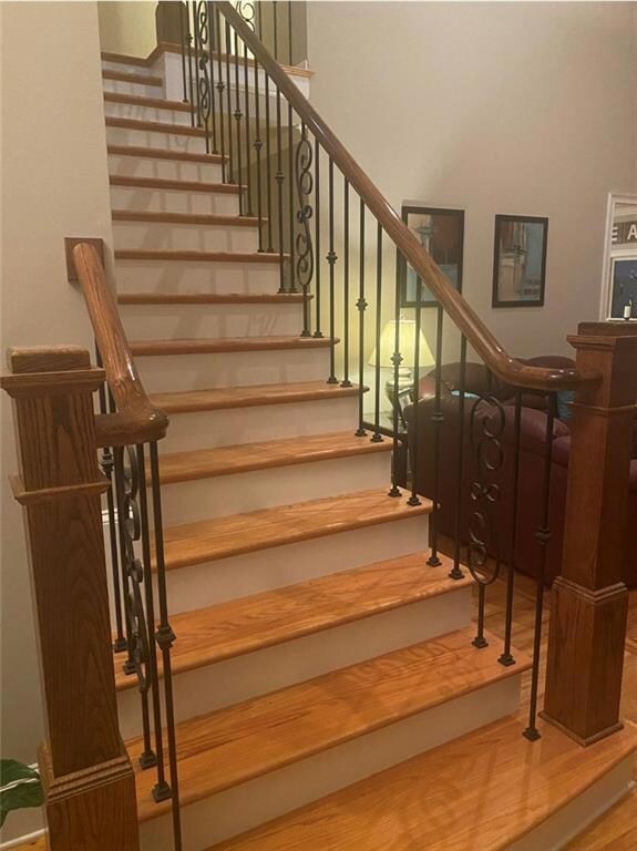 Stairway with wood finished floors