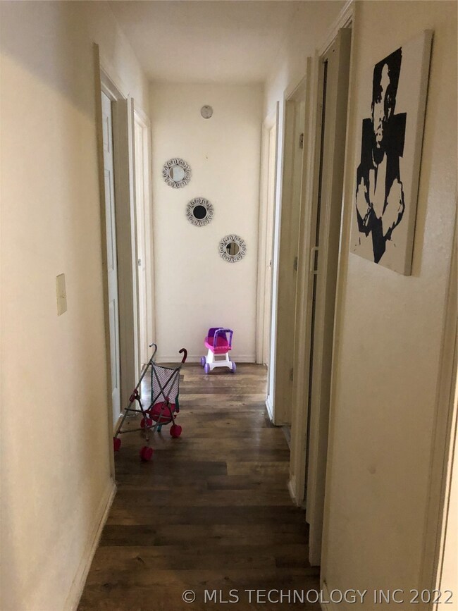 Hallway to 3 bedrooms and hall bath.