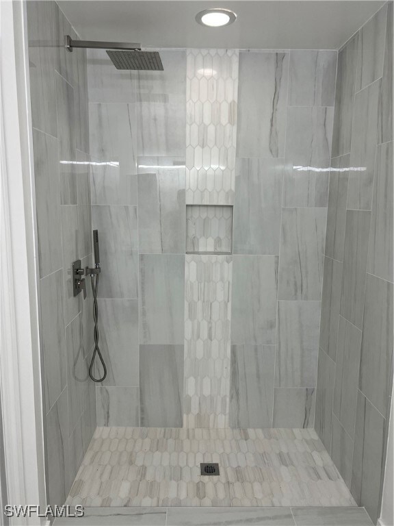 Bathroom with a tile shower