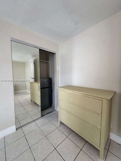 Refrigerator & Microwave located in closet