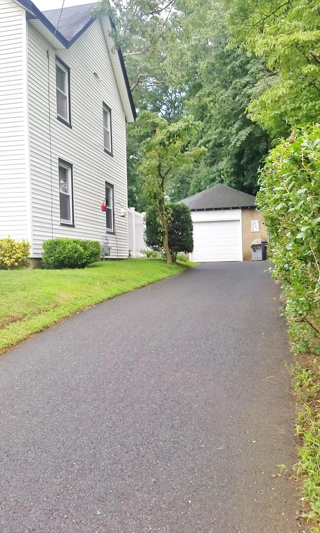Looking up driveway from property line
