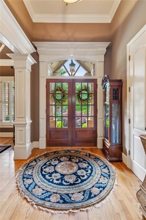 Foyer entrance featuring light wood finished floor
