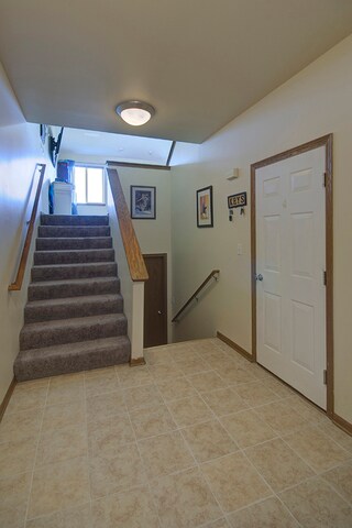 Great open foyer area allowing access to the garag