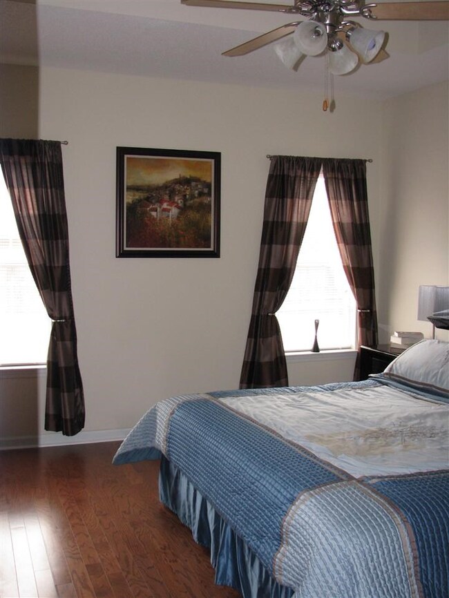 Spacious master bedroom, with hardwood flooring!