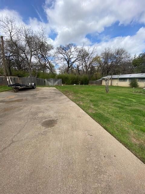 Driveway onto lot waiting for you to build your ne