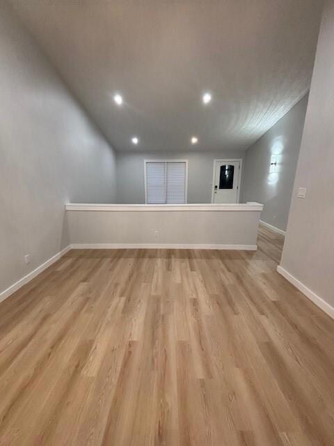 View Of Family Room & Front Door From The Dining R
