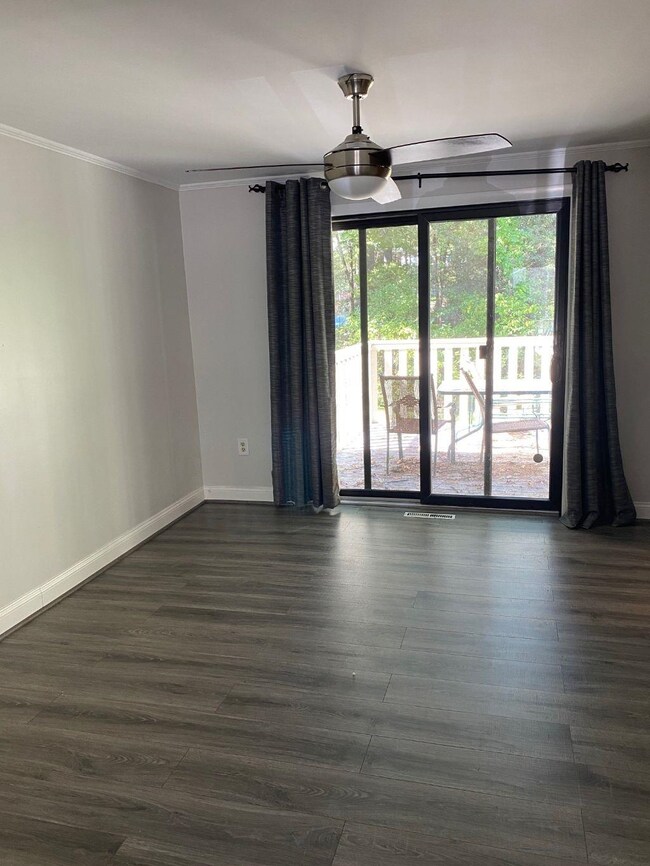 to freshly painted deck .Private in rear as it backs up to  a wooded area.