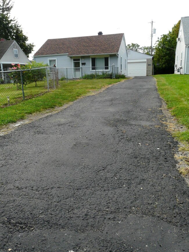 LONG DRIVE TO 2 CAR GARAGE
