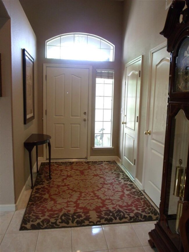 ENTRY FOYER, LIGHT AND AIRY.