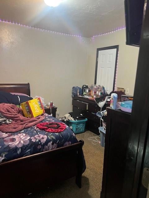 Bedroom featuring carpet floors