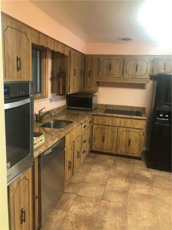 Kitchen has a pantry and room for a table