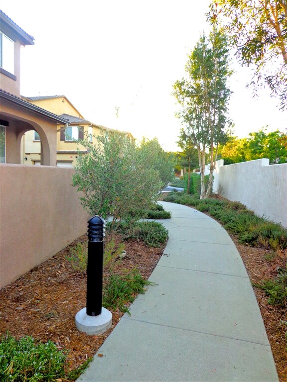 Walkway to front of condos