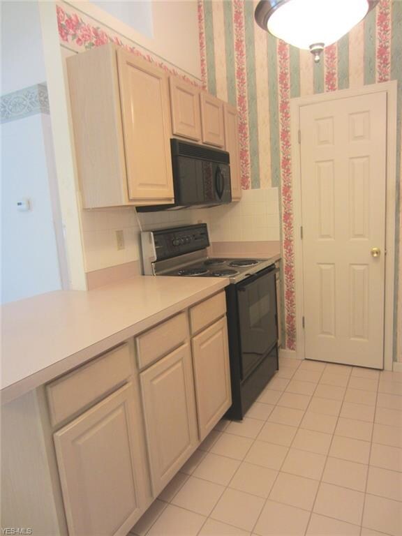 Kitchen with large pantry.