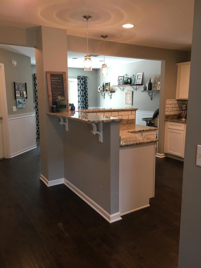 Kitchen island with raised bar and granite counter tops!