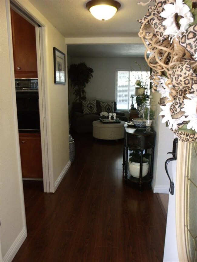 COME ON IN AND TAKE A LOOK. NOTE RICH WOOD-LOOK FL