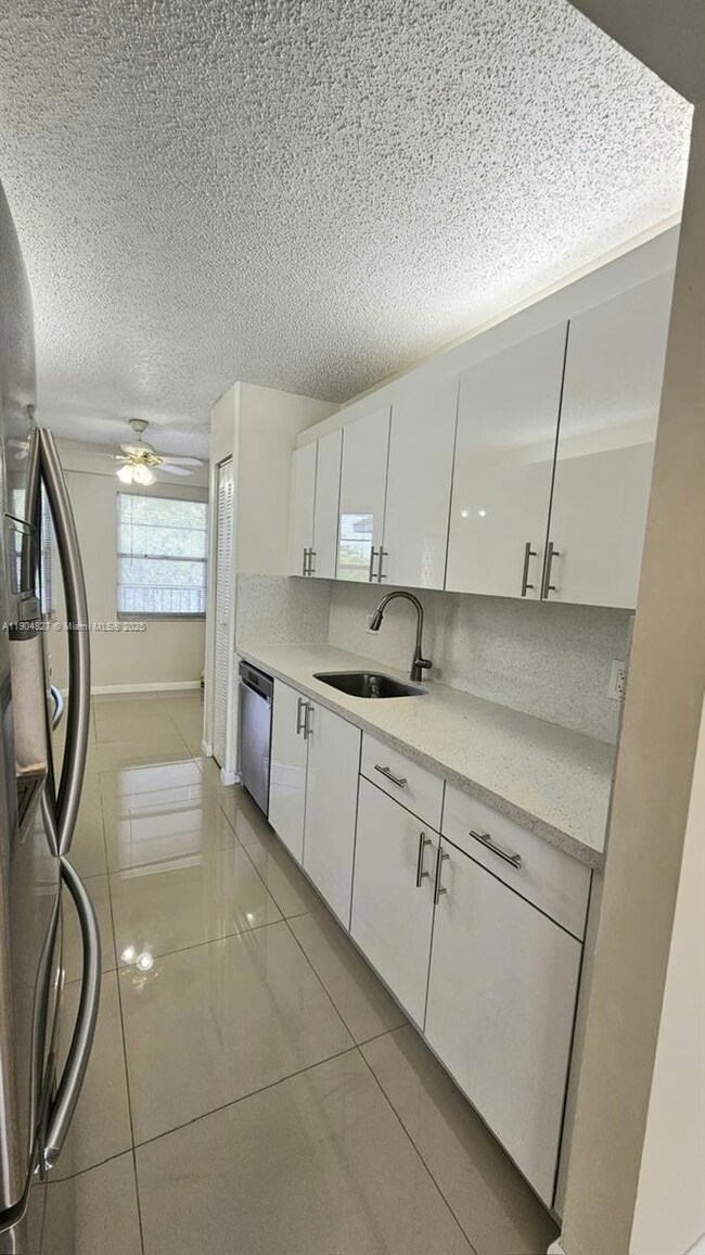 1401 SW 128th Terrace unit H410, Pembroke Pines, FL 33027 - photo 6