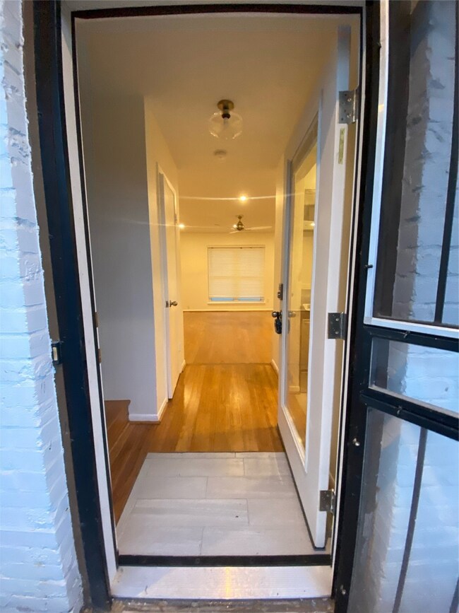 You enter onto a tile foyer and into the expansive first level of this lovely townhome.