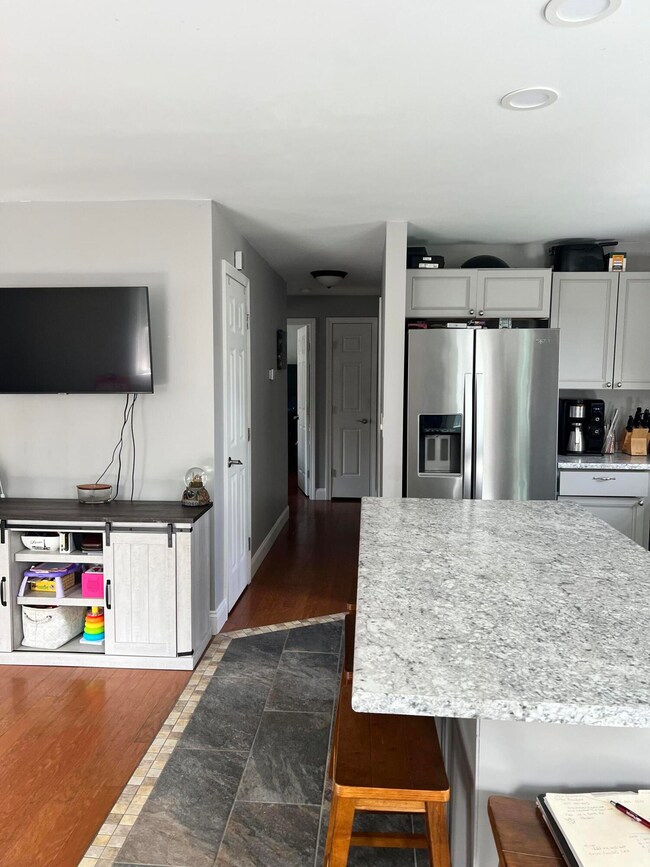 kitchen facing hallway to bedrooms
