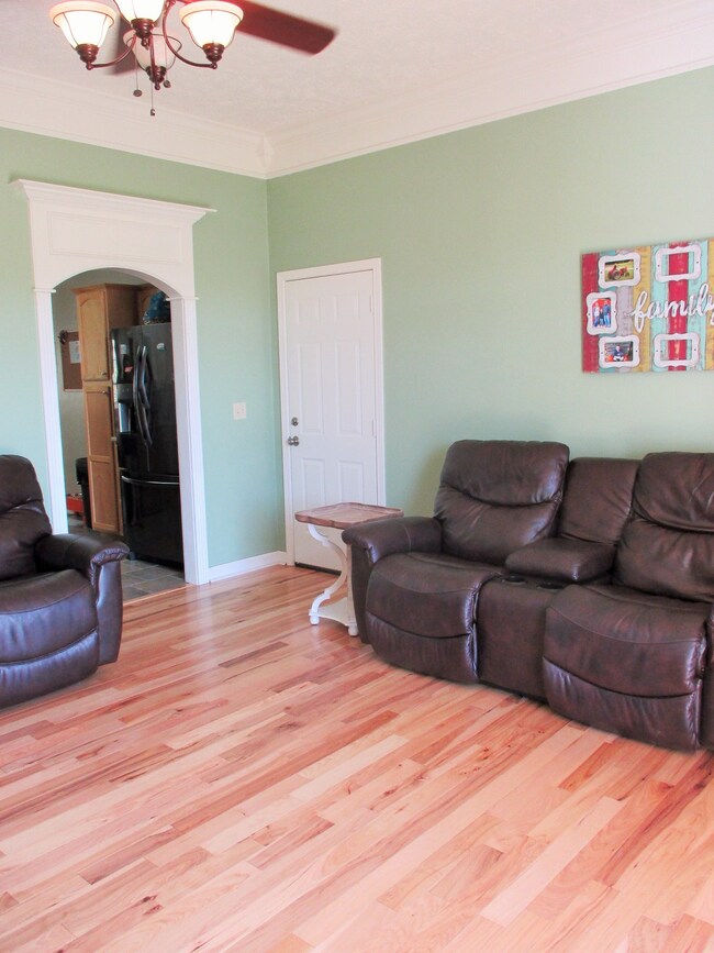 Beautiful hardwoods welcome you inside (garage door to right)