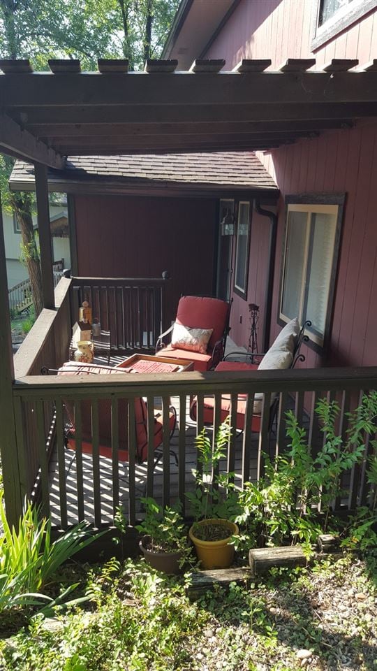 Covered deck in front offers great view from the t