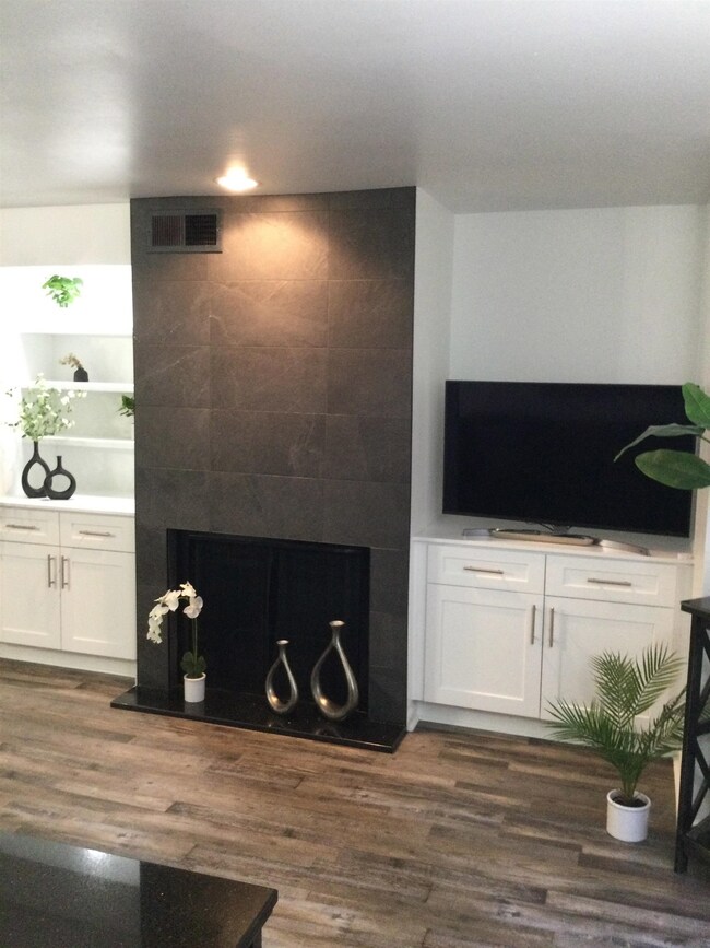 Living room with new added bookshelves and storage