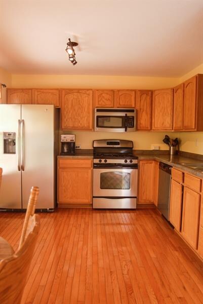 Stainless appliances and updated light fixtures.