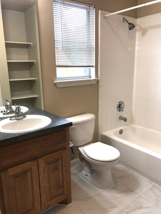 Full bath with washtub / shower combination, toil