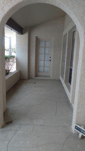 FRONT PATIO DOOR TO DEN