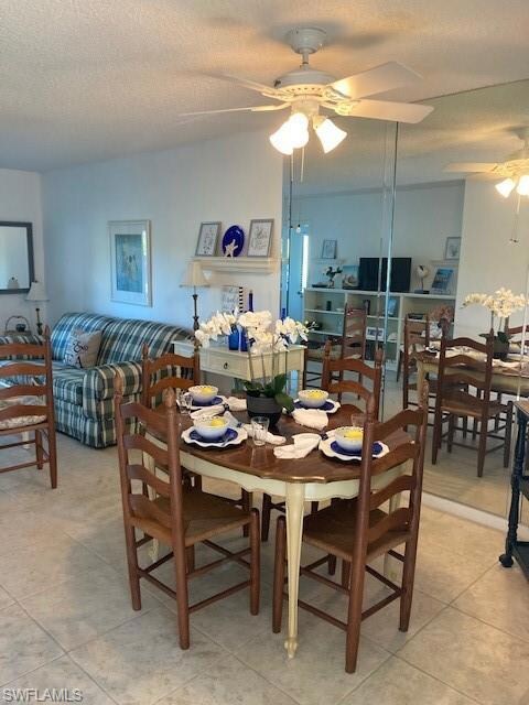 dining area with lovely mirrored wall
