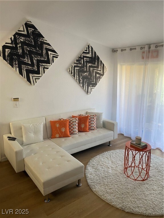 Living room with wood finished floors