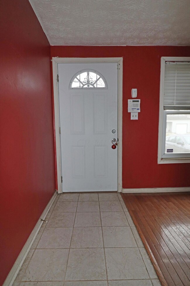 Foyer area with ceramic tile floor