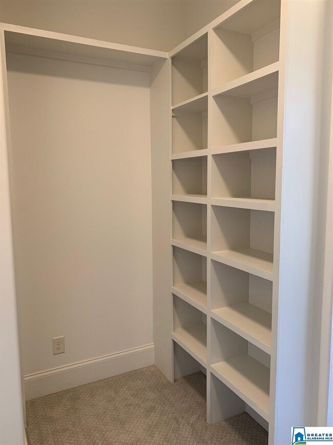 The amount of custom built shelving and shoe racks in the Master Closet is crazy!