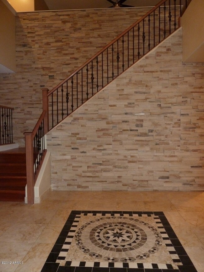 gorgeous foye entry travertine/granite