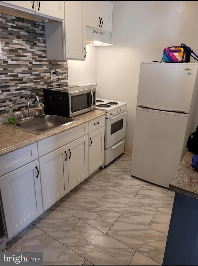 2053 S Cecil St unit 1, Philadelphia, PA 19143 - photo 3