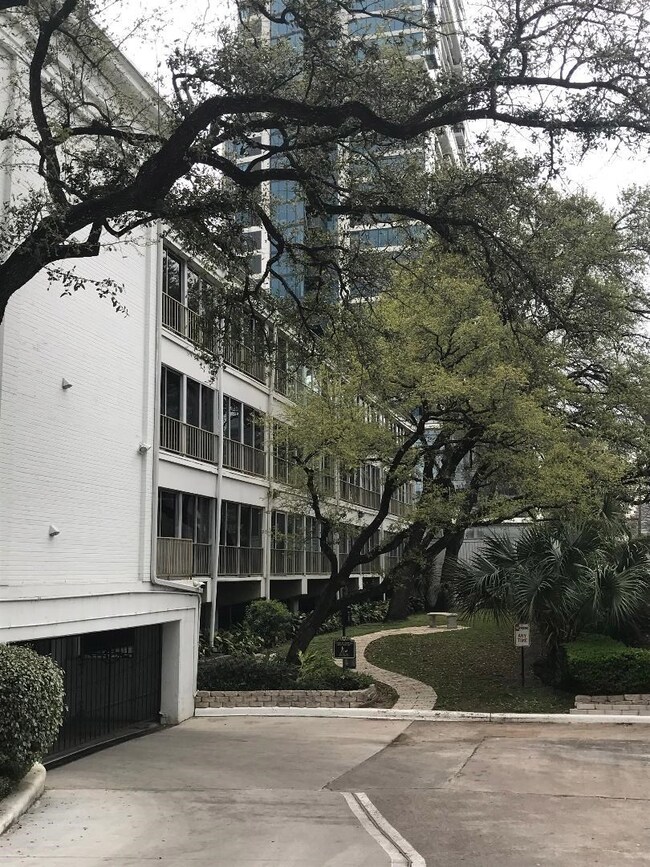 Gated parking garage and dog walk area
