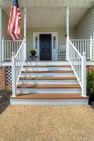 Aggregate Walkway and cozy front porch
