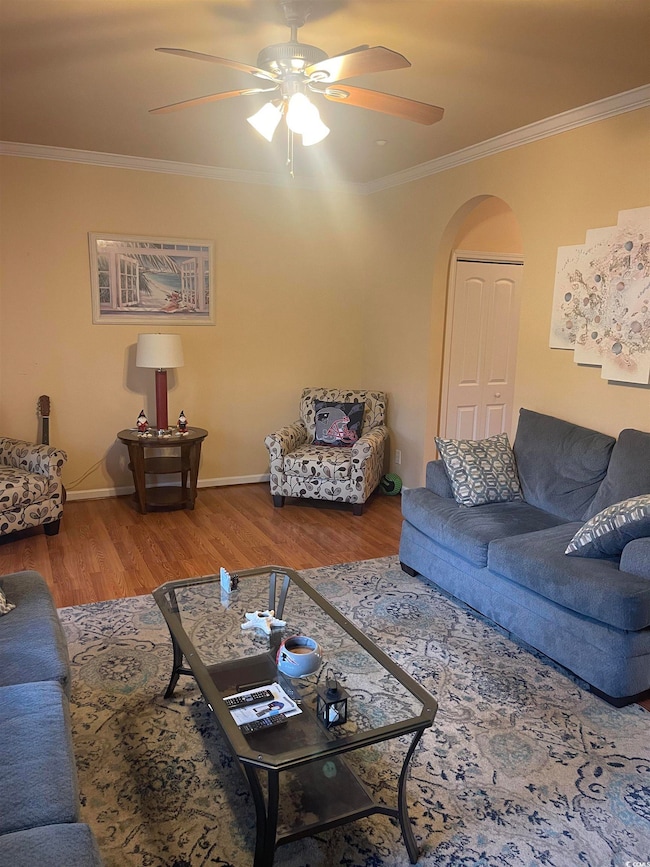 Living room with hardwood / wood-style floors, orn
