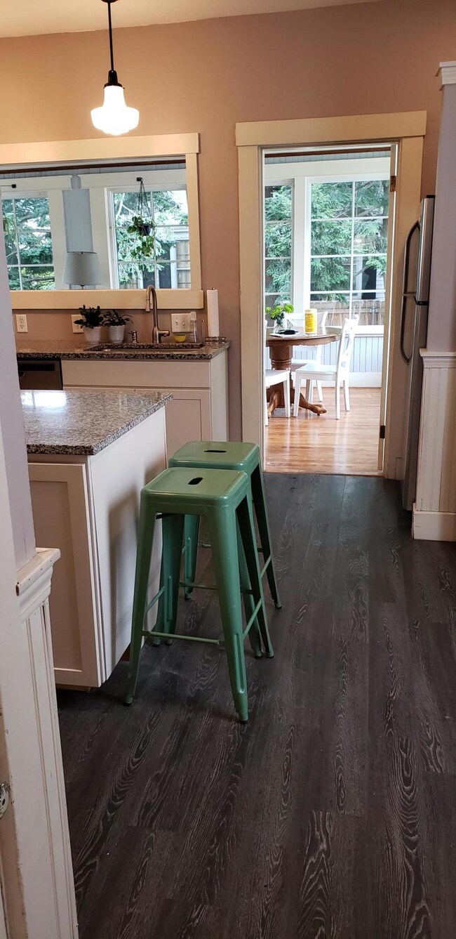 kitchen overlooks Sunroom