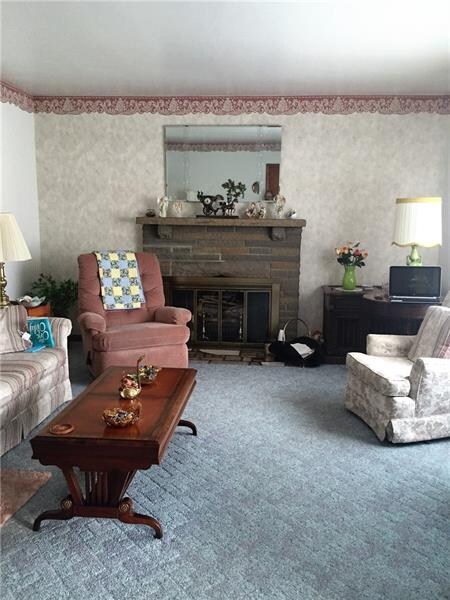 Lovely living room with large picture window and f