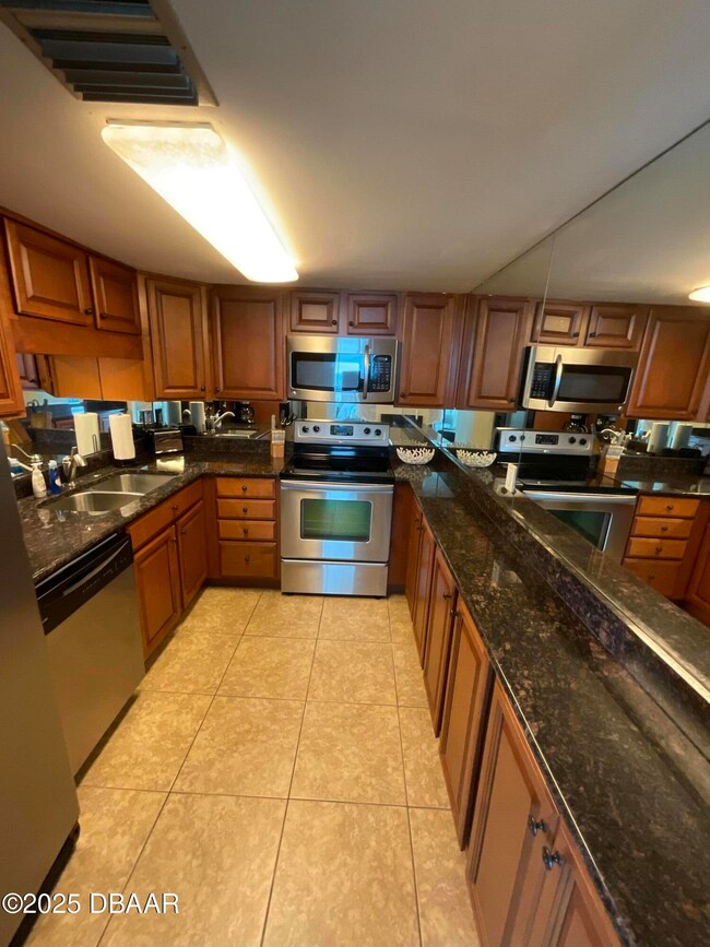Peck Plaza unit 27SW, Daytona Beach, FL 32118 - photo 3