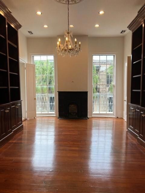 Living Room Fireplace and Floor to Ceiling Windows