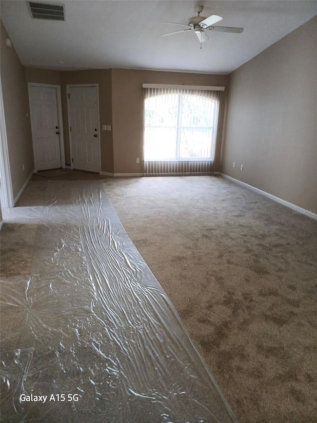Great room with brand new carpets and freshly painted